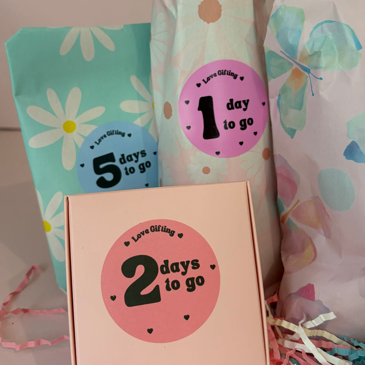 Countdown cards with '2 days to go' and other countdowns on a light background
