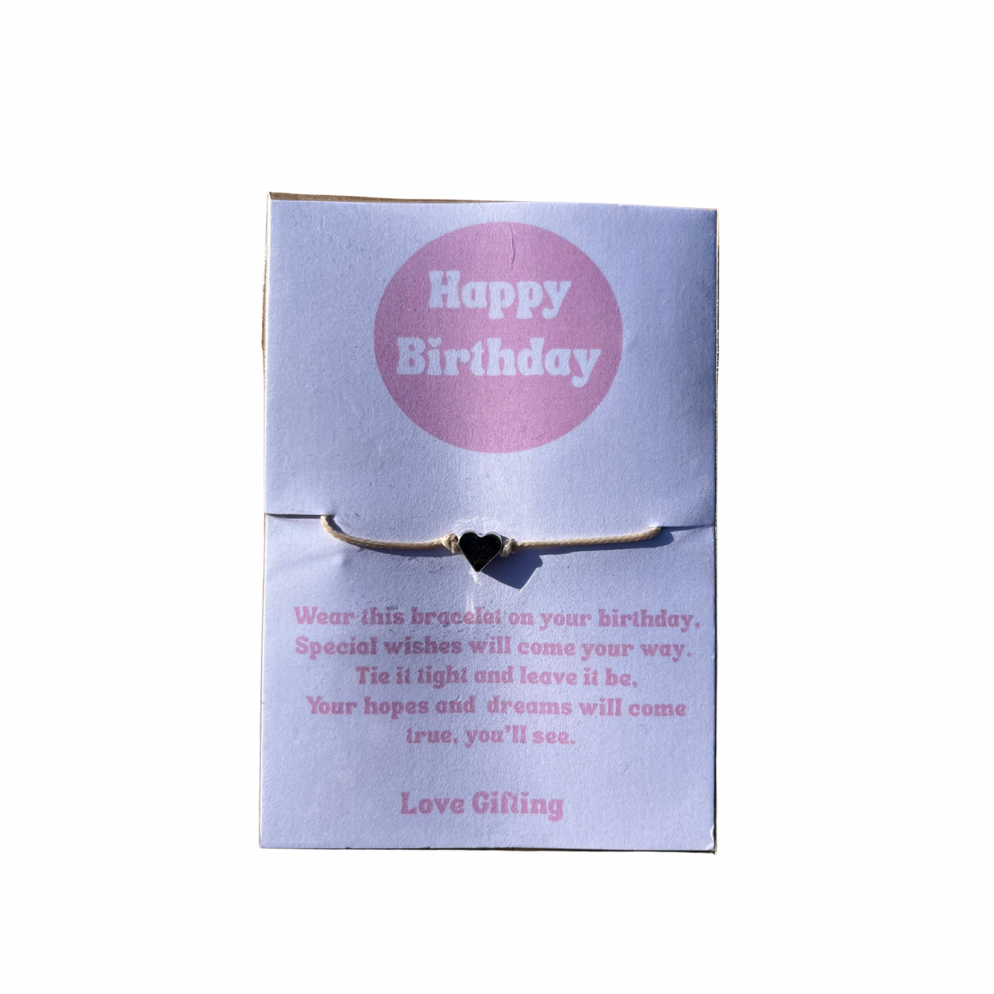 Bracelet on a 'Happy Birthday' card with text