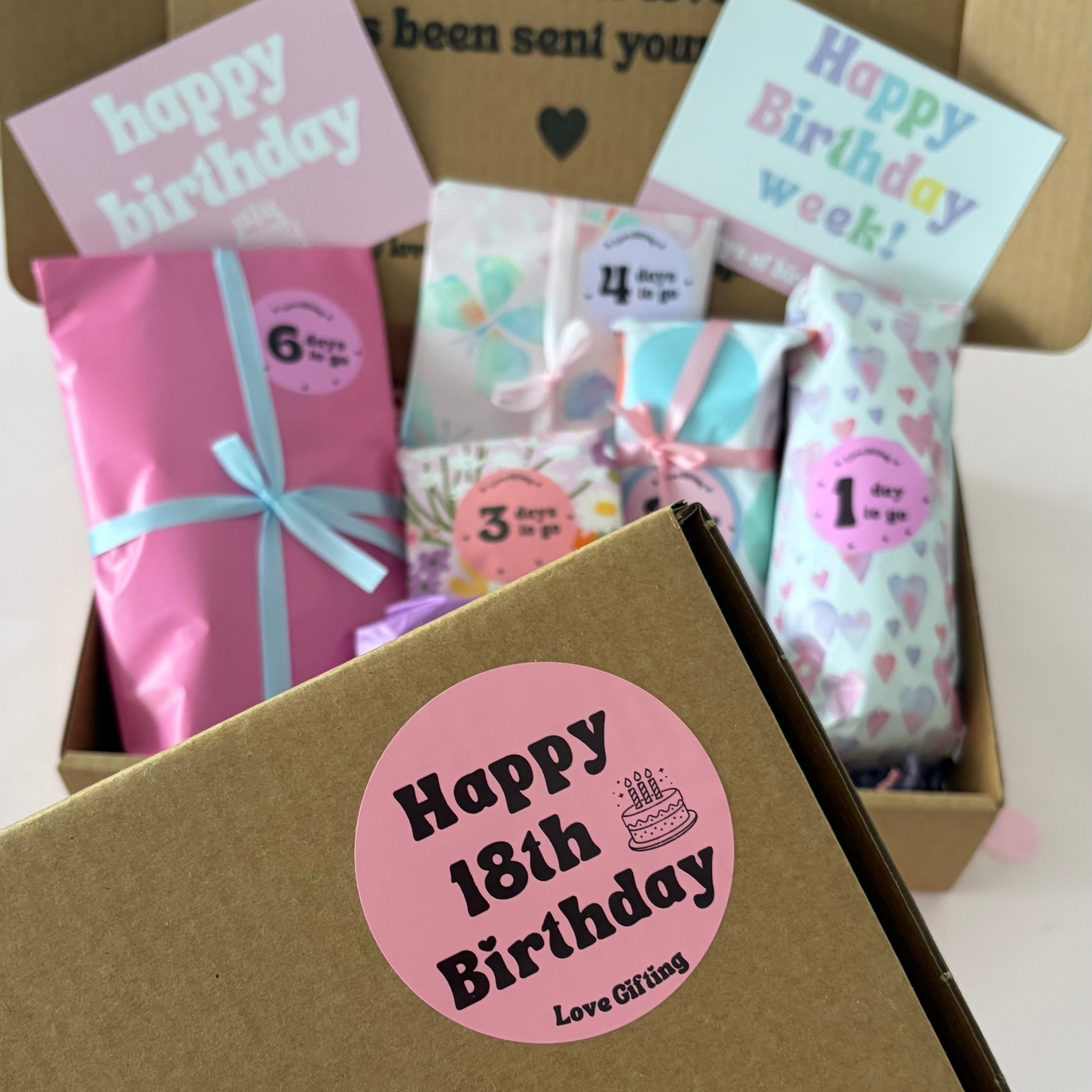 Open 18th Birthday Advent gift box with individually wrapped birthday surprises.