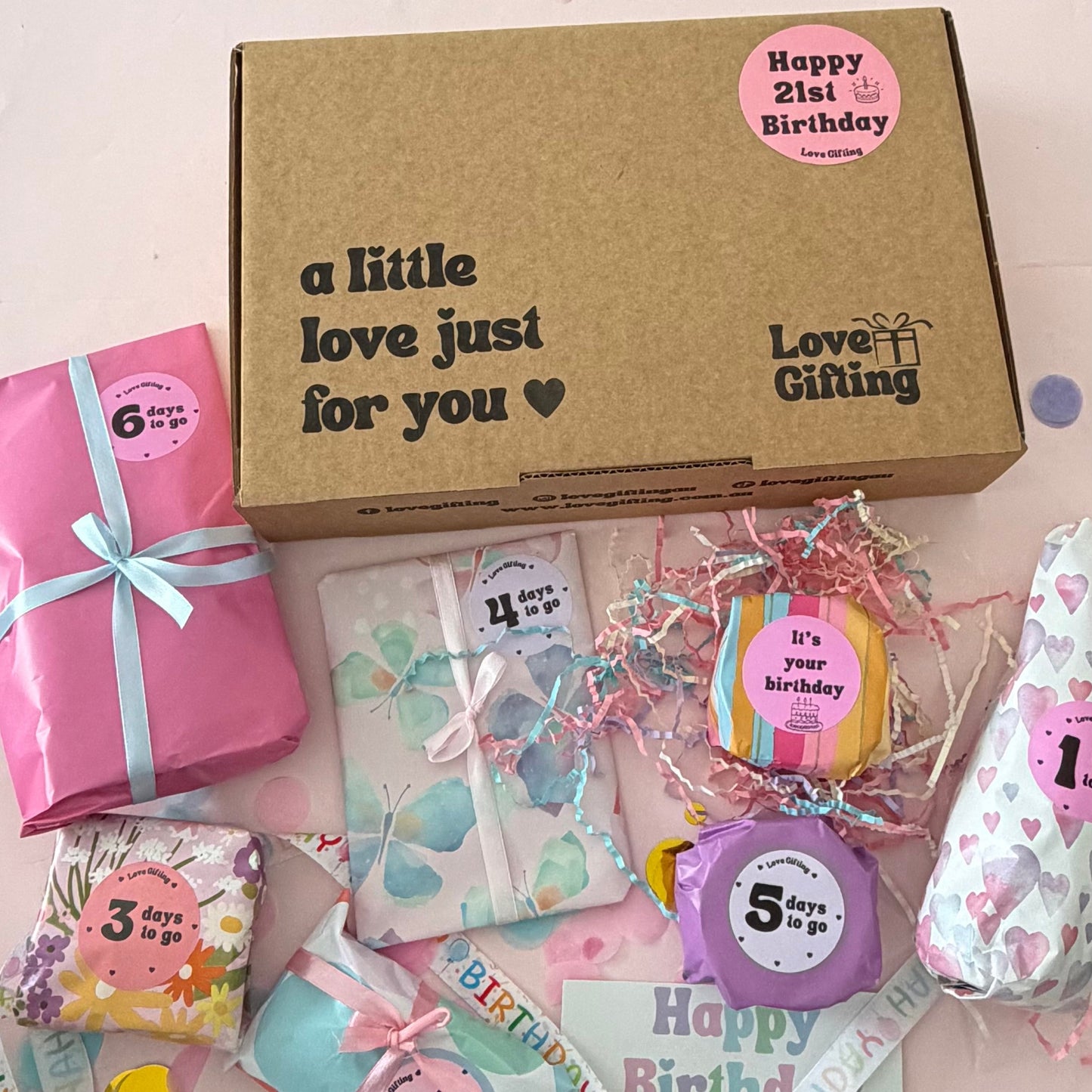 21st Birthday Advent gift box with 7 individually wrapped surprises by Love Gifting.
