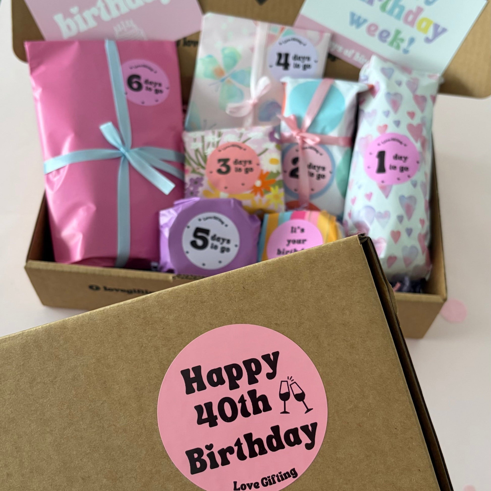Open 40th Birthday Advent gift box with individually wrapped birthday surprises.
