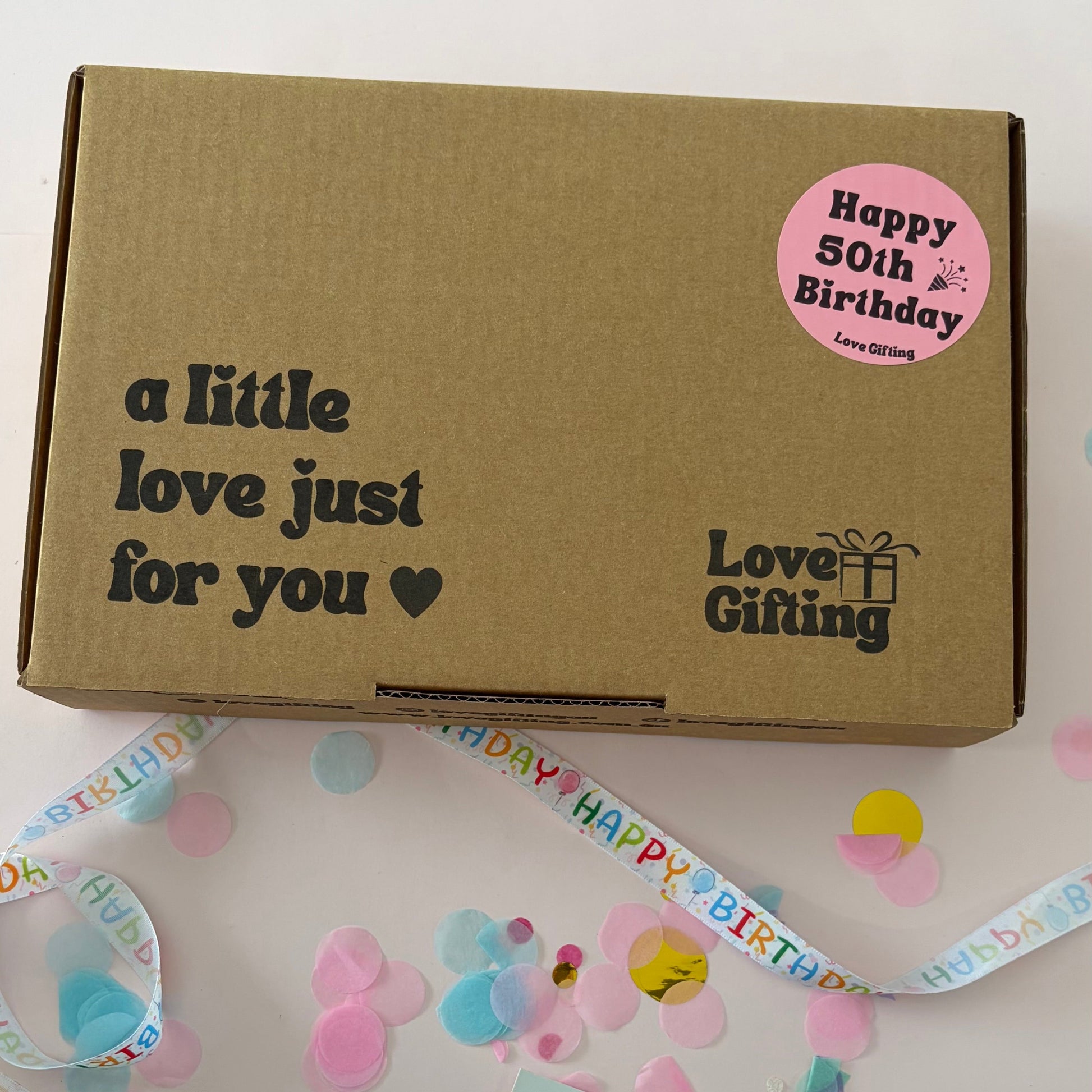 50th Birthday Advent gift box with Happy 50th Birthday sticker, ready to gift.