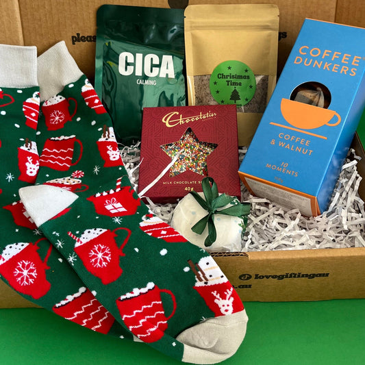 unwind Christmas Box, coffee, socks showered steamer 
