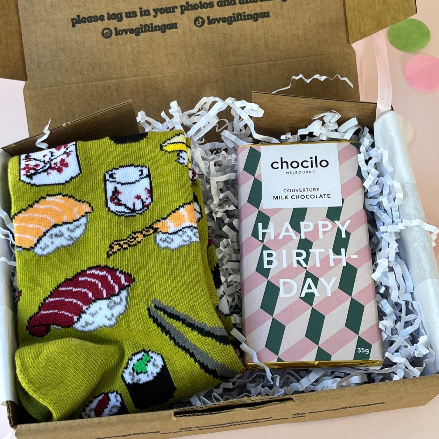 Box with sushi socks and a Happy Birthday chocolate bar
