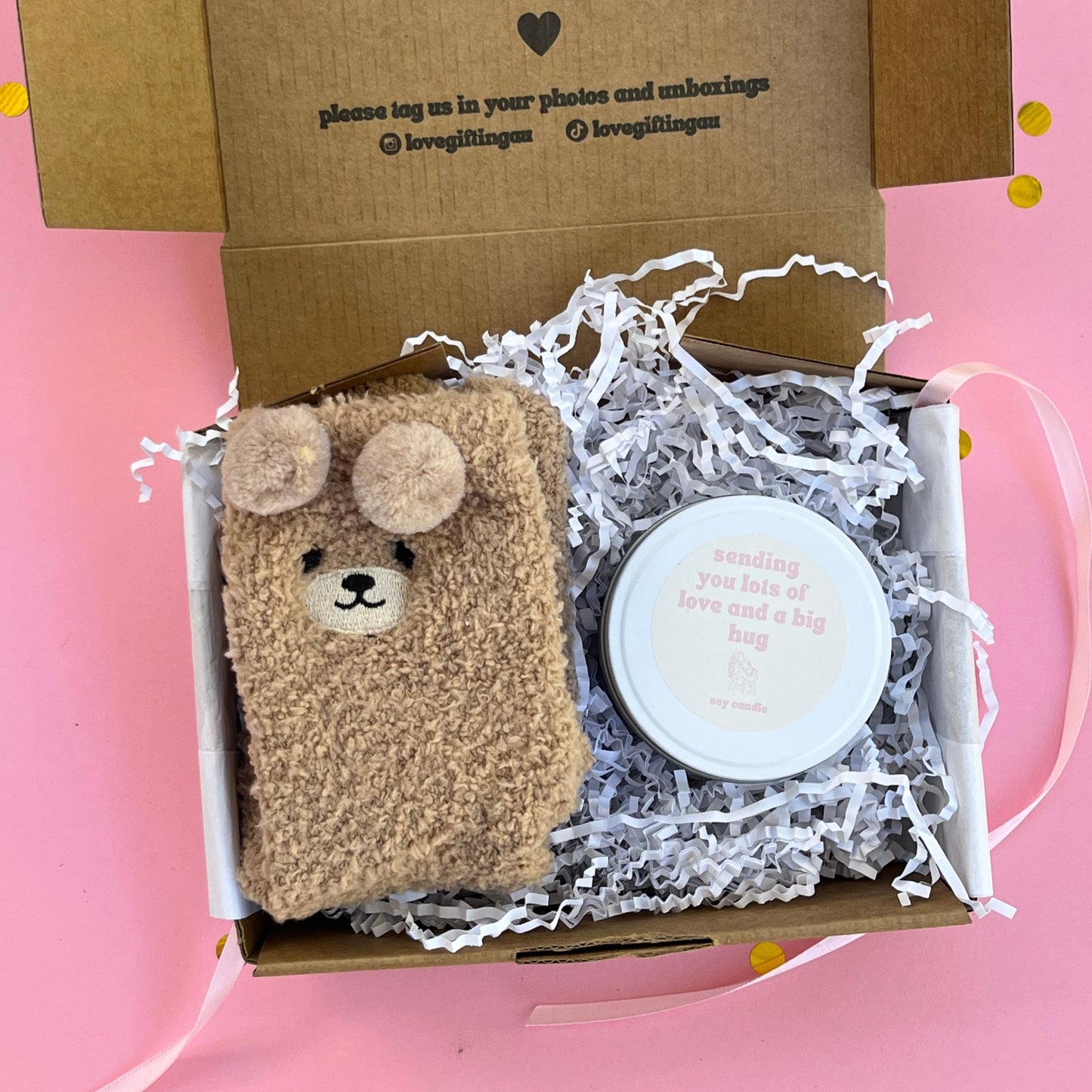 Box with bear fluffy socks and a hug candle