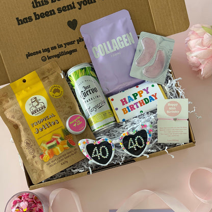 40th Gift box features cocktail, tropical jellies, 40th sunglasses, facemask, happy birthday chocolate