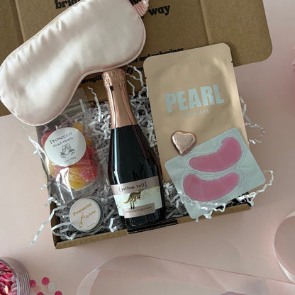 Prosecco gift box includes prosecco, lapcos face mask, sleep mask, prosecco lipbalm, chocolate heart