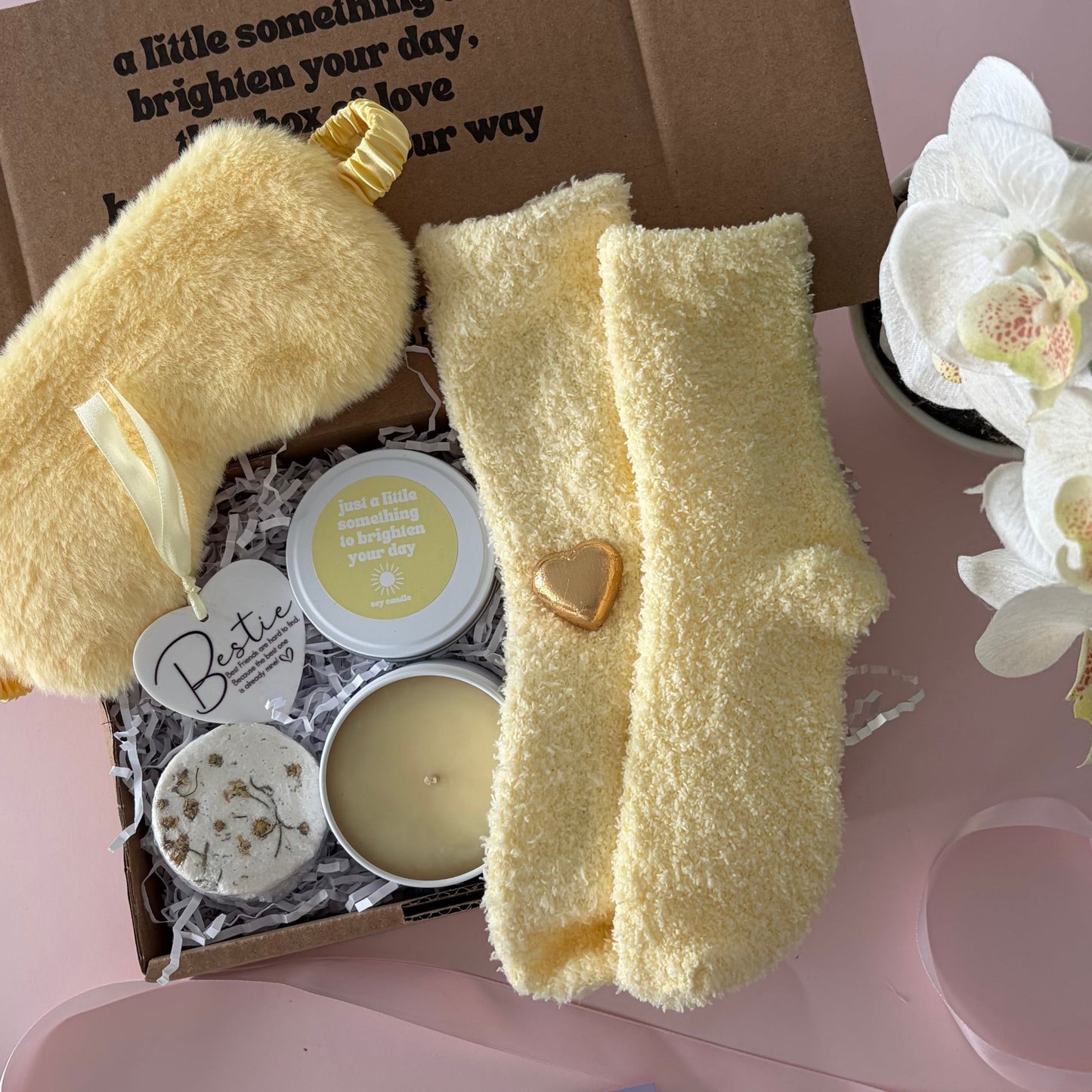 Yellow Bestie gift box, yellow socks, sending sunshine candle, calm shower steamer, gold choc heart.