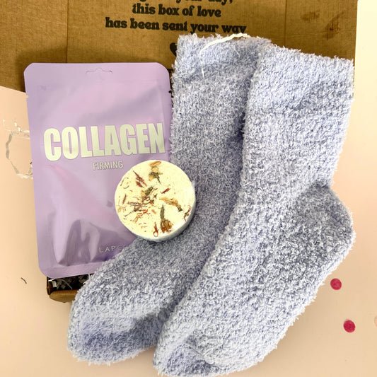 gift box with socks, face mask and shower steamer
