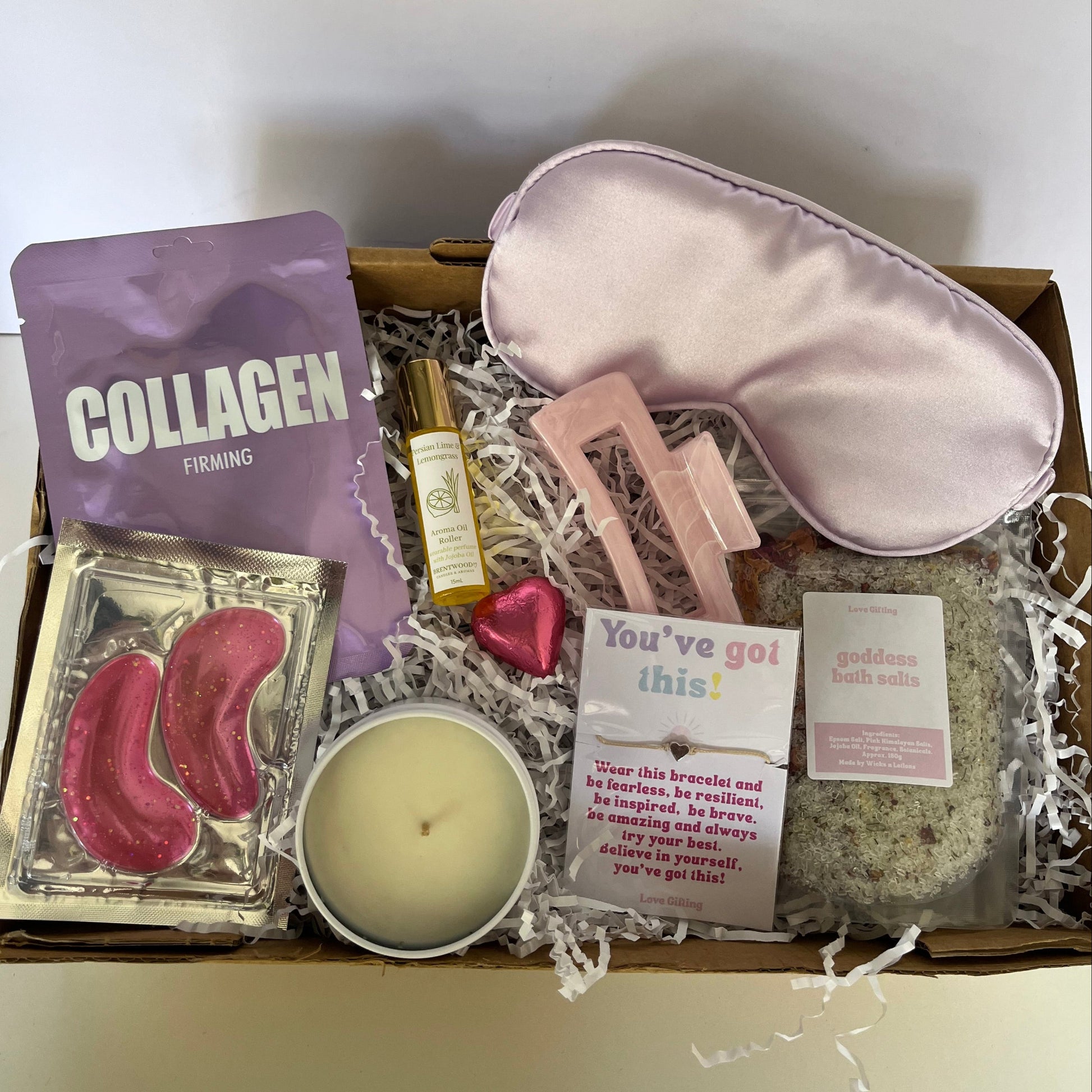 You've got this pamper gift box - roler, facemask, eye mak, candle, bracelet , hair clip and bath salts