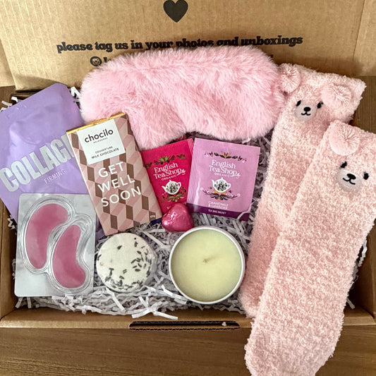 Box of get well soon self-care items with a message on the lid