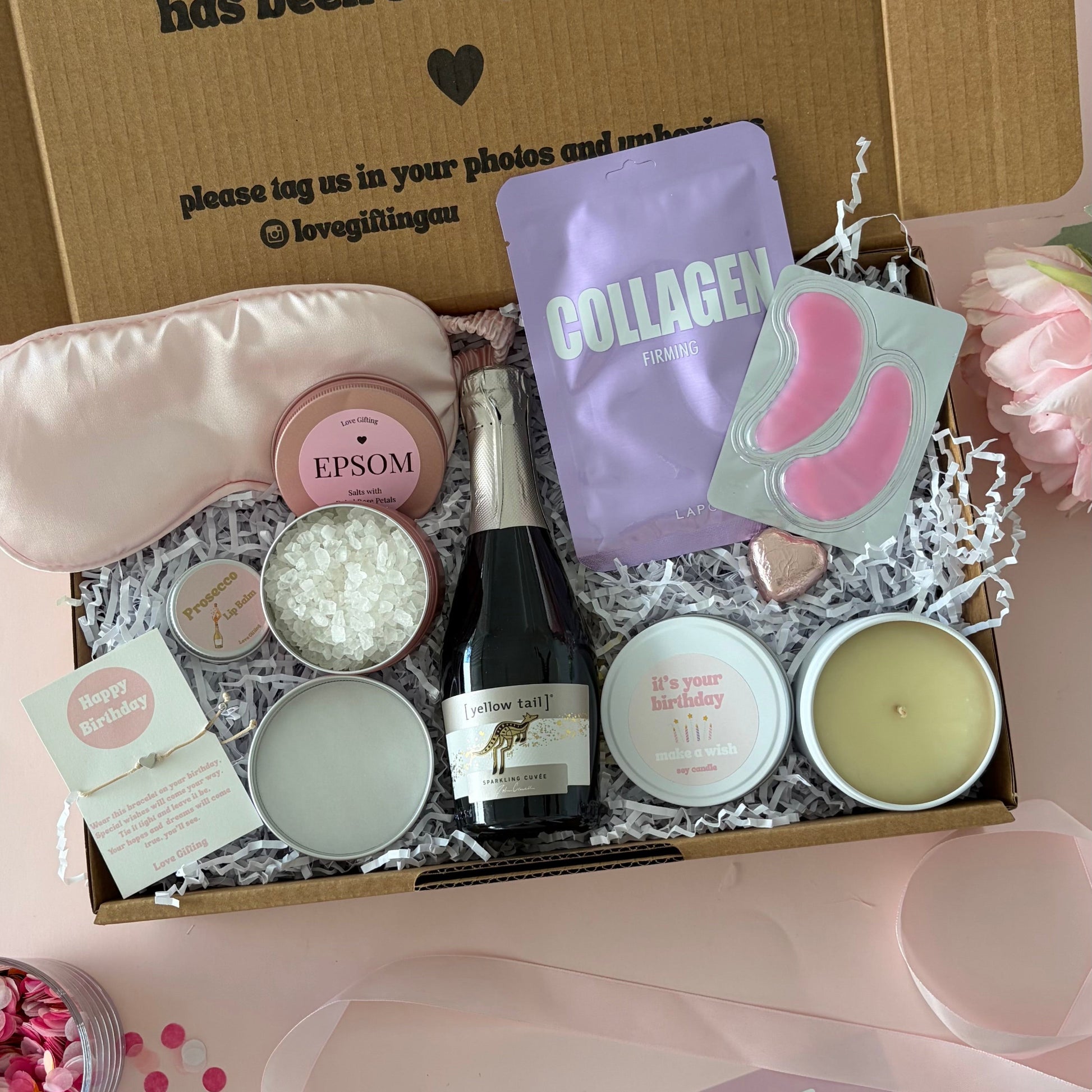 Prosecco birthday gift box filled with facemask, candle, sleep mask, lipbalm etc