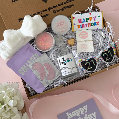 Vodka birthday box includes face mask, under eye, candle , glasses , happy birthday chocolate and 21st birthday bracelet