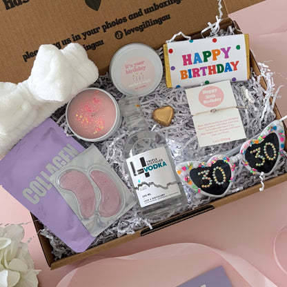 Vodka 30th birthday box includes facemask, under eye, candle , glasses , happy birthday chocolate and 30th birthday bracelet