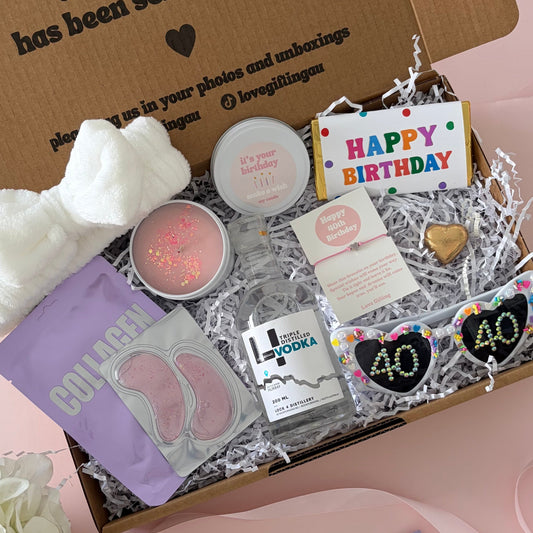 Vodka 40th birthday box includes facemask, under eye, candle , glasses , happy 40th birthday chocolate and birthday bracelet