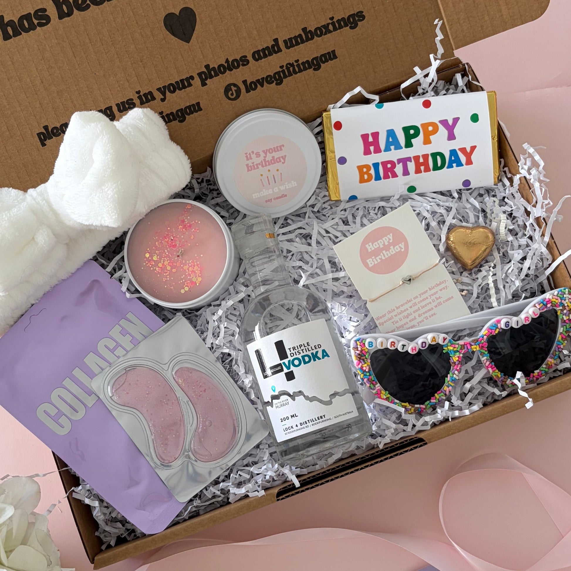 Vodka birthday box includes facemask, under eye, candle , glasses , happy birthday chocolate and birthday bracelet