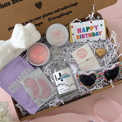Vodka birthday box includes facemask, under eye, candle , glasses , happy birthday chocolate and birthday bracelet
