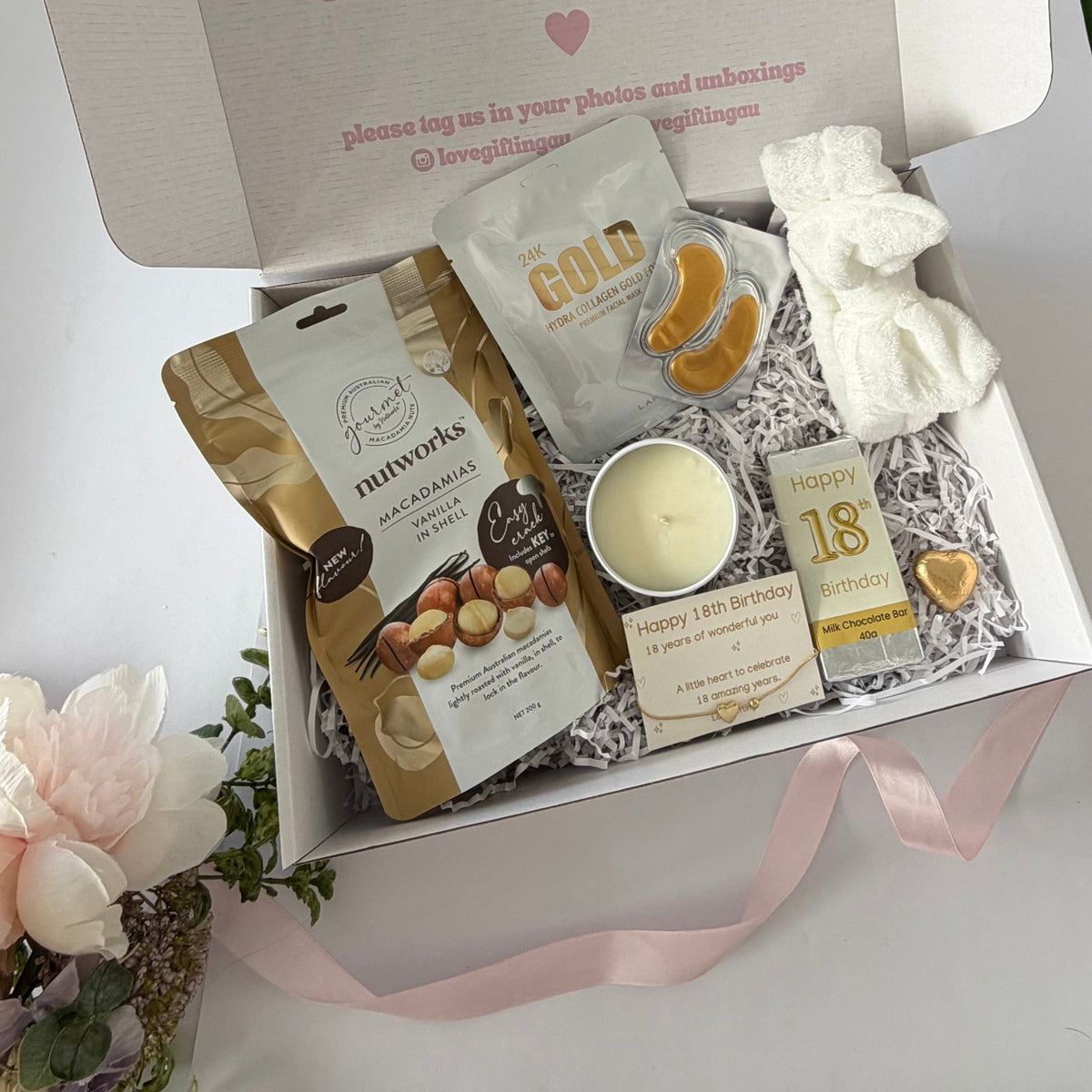 Celebrate her 18th with a beautiful birthday gift box filled with pampering, treats and a milestone keepsake. Optional sparkling wine. Australia-wide delivery.