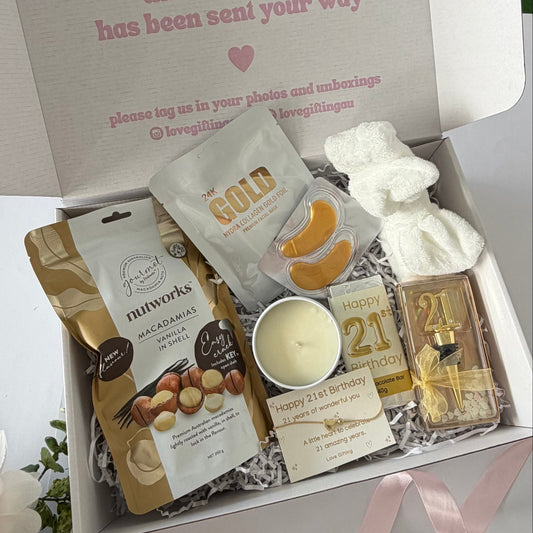 21st birthday gift box for her with pamper treats, chocolate, candle and keepsake bracelet Australia