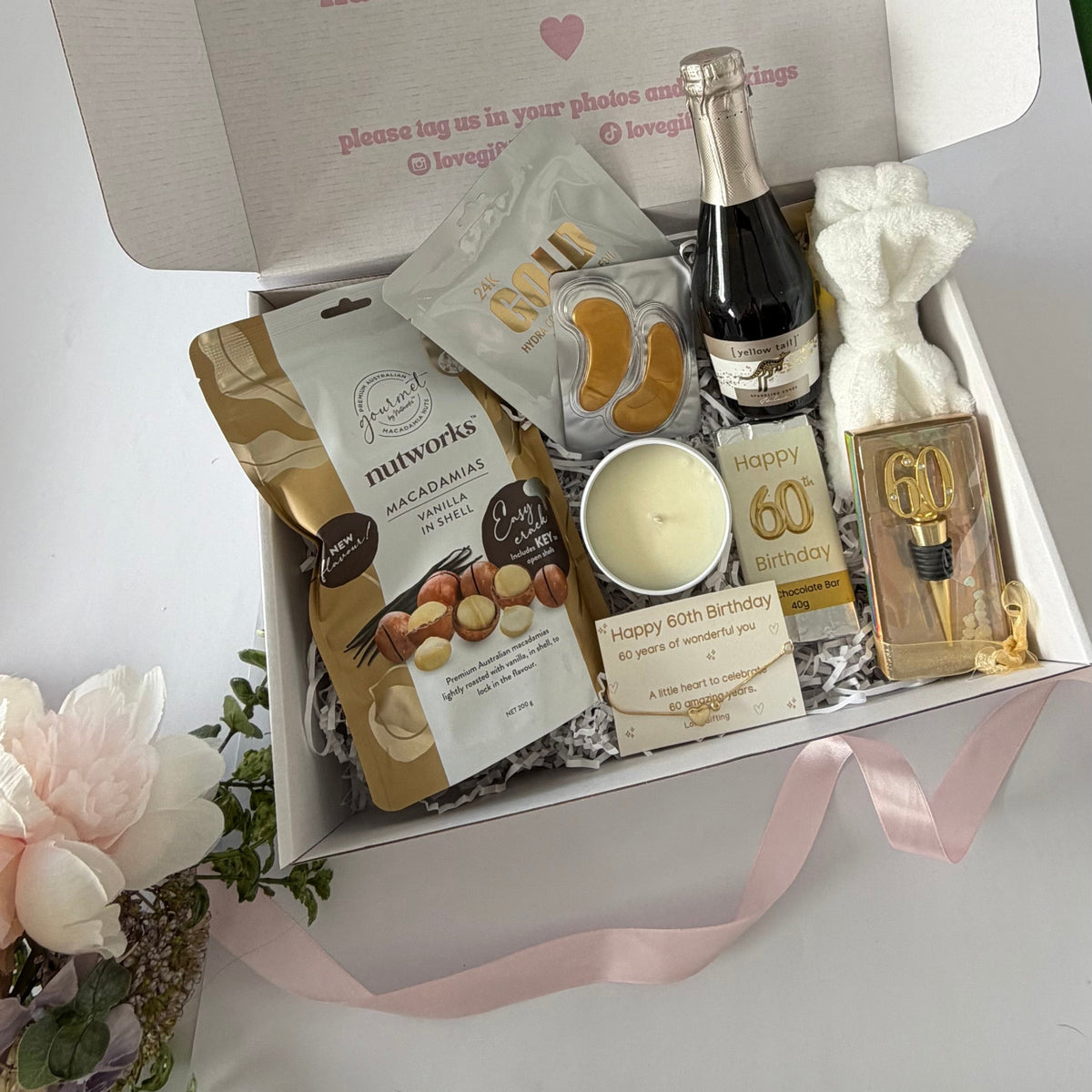 60th birthday gift box for her with pamper treats, chocolate, candle , prosecco and keepsake bracelet Australia