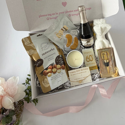 60th birthday gift box for her with pamper treats, chocolate, candle , prosecco and keepsake bracelet Australia