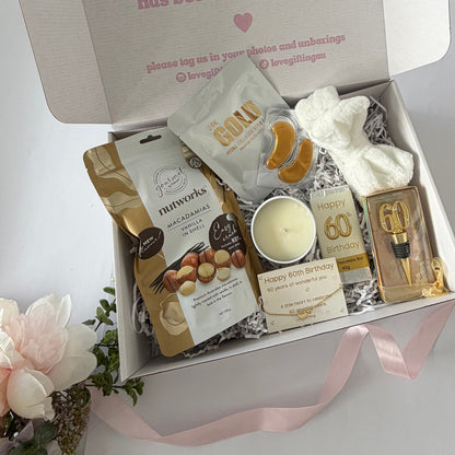 60th birthday gift box for her with pamper treats, chocolate, candle and keepsake bracelet Australia