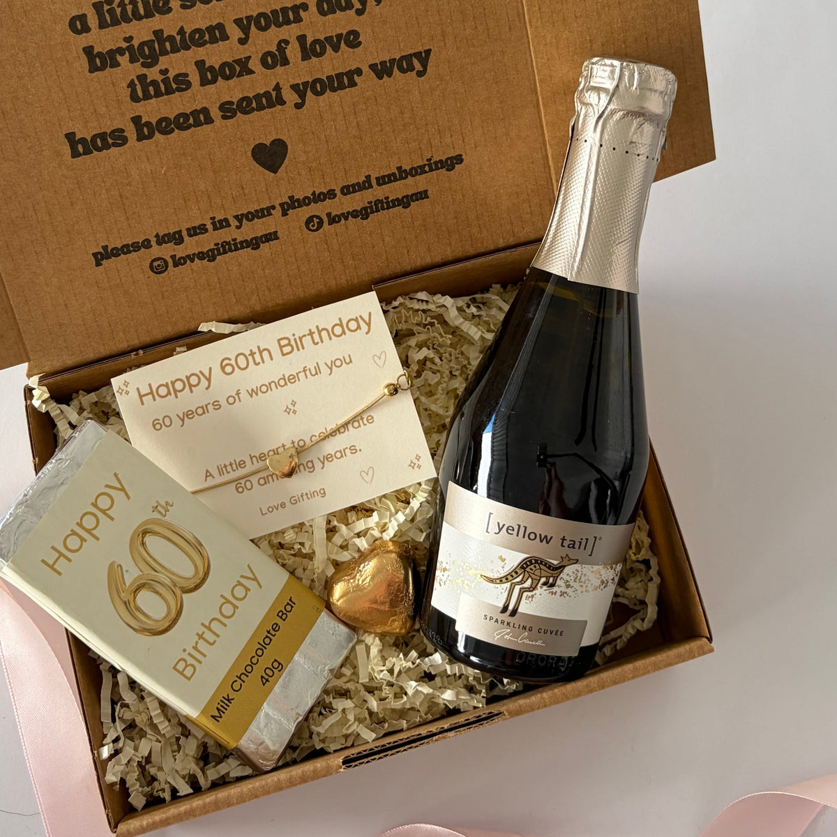 60th birthday gift box for her with sparkling wine, chocolate, bracelet and wine stopper Australia