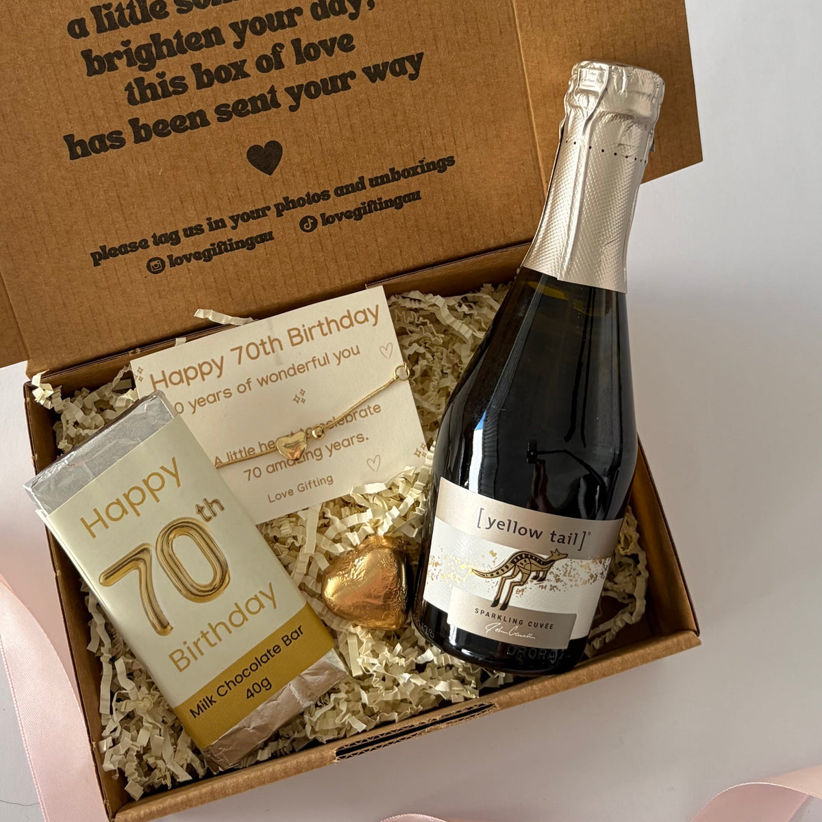 70th birthday gift box for her with sparkling wine, chocolate, bracelet Australia