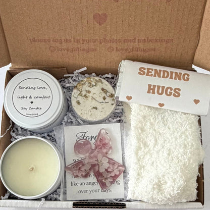 Sending Love & Light sympathy gift box with Hug in a Mug, comforting soy candle, cosy socks, shower steamer, chocolates and thoughtful keepsakes by Love Gifting.