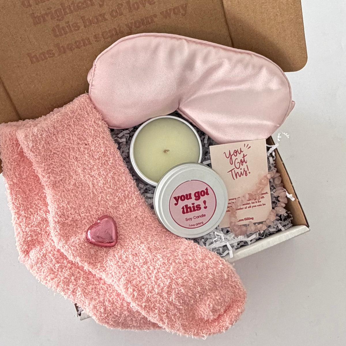 Send comfort with our You've Got This gift box. Featuring cosy socks, Japanese Honeysuckle candle, sleep mask and rose quartz bracelet. Australia-wide delivery.
