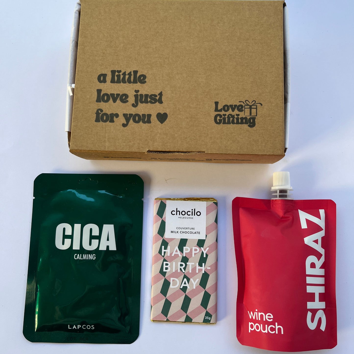Gift box for Men or Women including Lapcos Facemask Sheet - Cica , Happy Birthday Chocolate Bar and a Shiraz wine pouch.