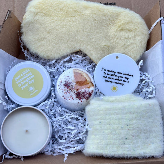 Gift set with yellow fluffy eye mask, candles, and shower steamer , socks and ceramic keepsake 