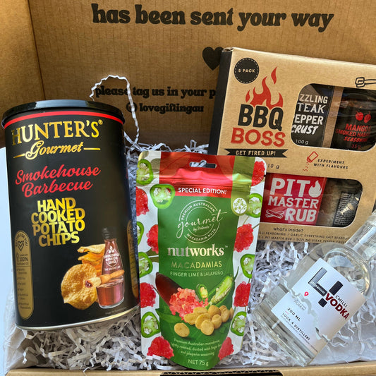 Mens BBQ Gift box with food products including 'BBQ Boss,  Hunter's Handcrafted Barbecue Chips, Spicy Nuts and chilli Vodka