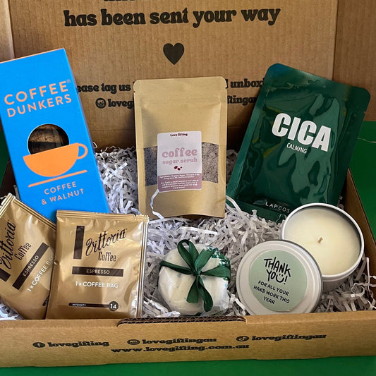 Gifts Box for men containing facemask, coffee scrub, candle and cookies