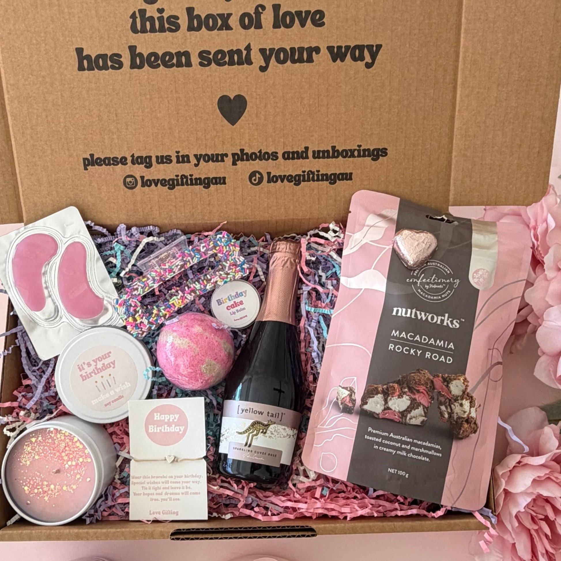 Birthday Gift Box contains Prosecco, rocky road, candle, bracelet, lipbalm , hair clip, bath bomb and eye mask