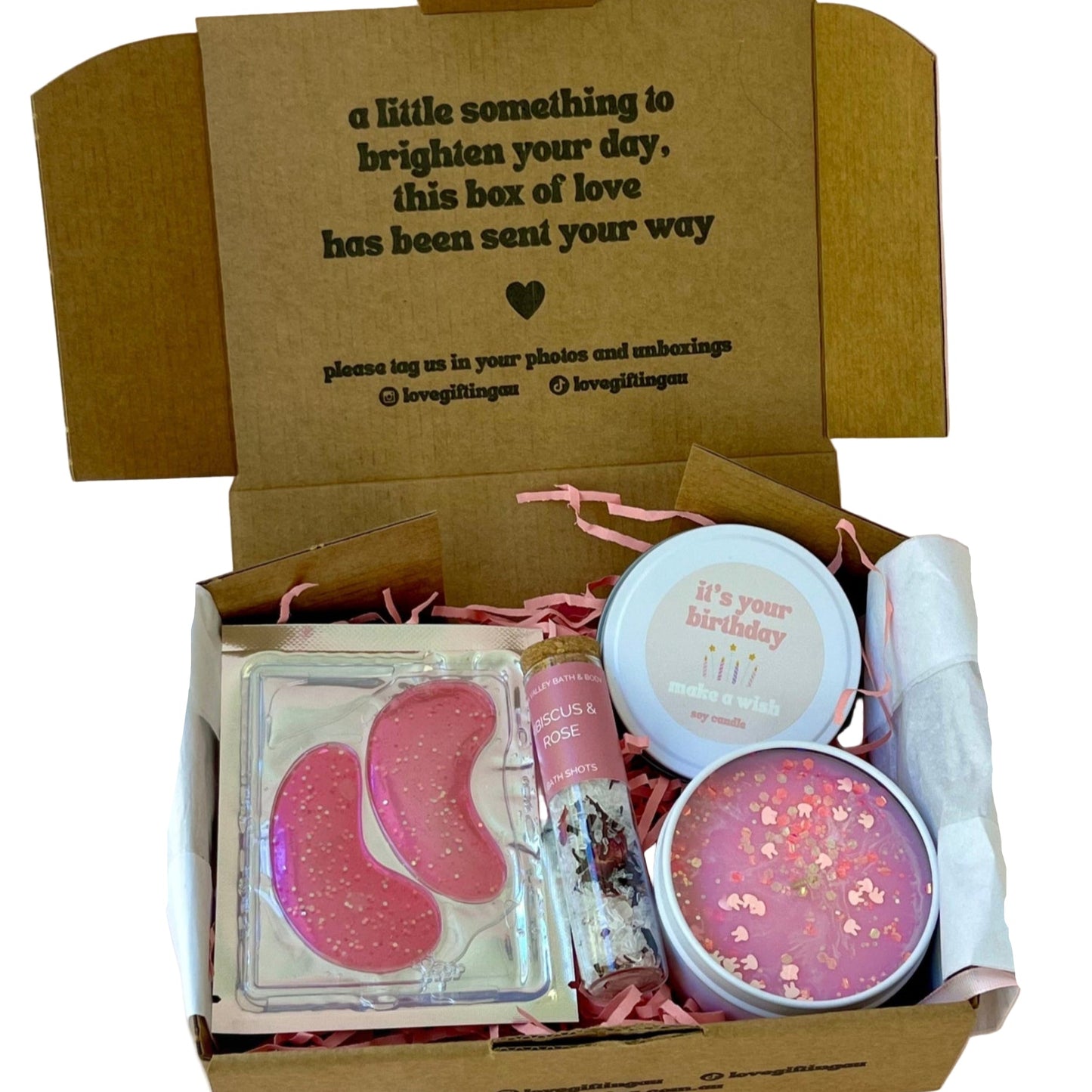 Gift box with pink collagen under eye patches, Bath Salt Soak and HAppy birthday candle