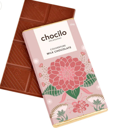 Chocolate bar with floral packaging and 'chocilo' branding on a white background