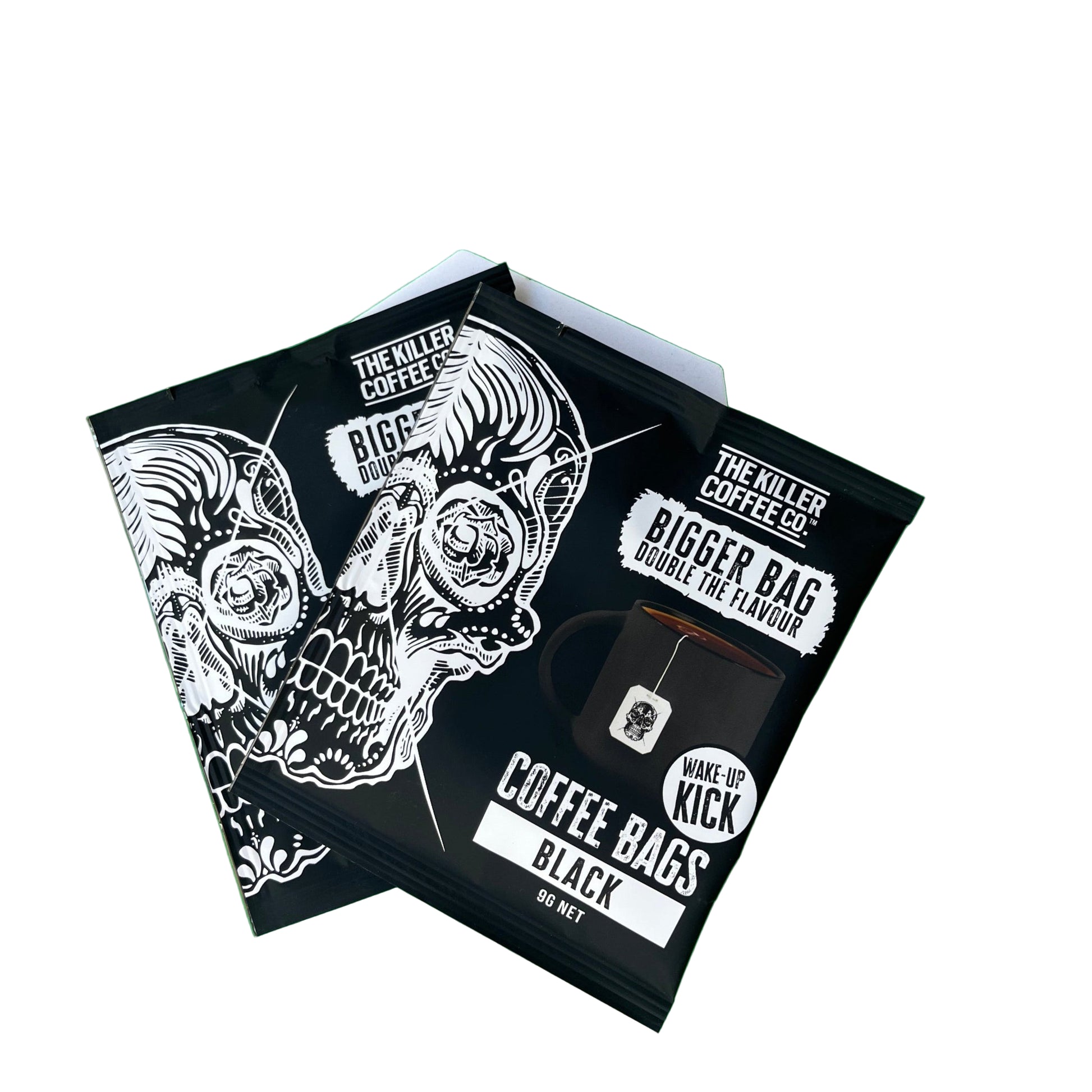 Black coffee bags with white designs on a green background