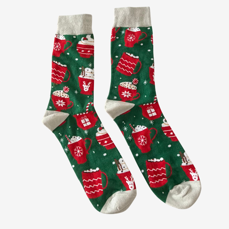 Festive green Christmas socks featuring colourful hot chocolate mugs, candy canes and snowflakes, a cosy Christmas gift box treat from Love Gifting.