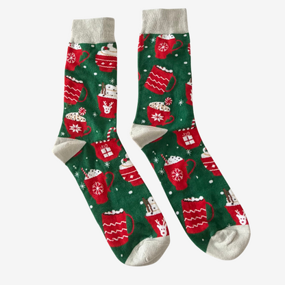 Festive green Christmas socks featuring colourful hot chocolate mugs, candy canes and snowflakes, a cosy Christmas gift box treat from Love Gifting.