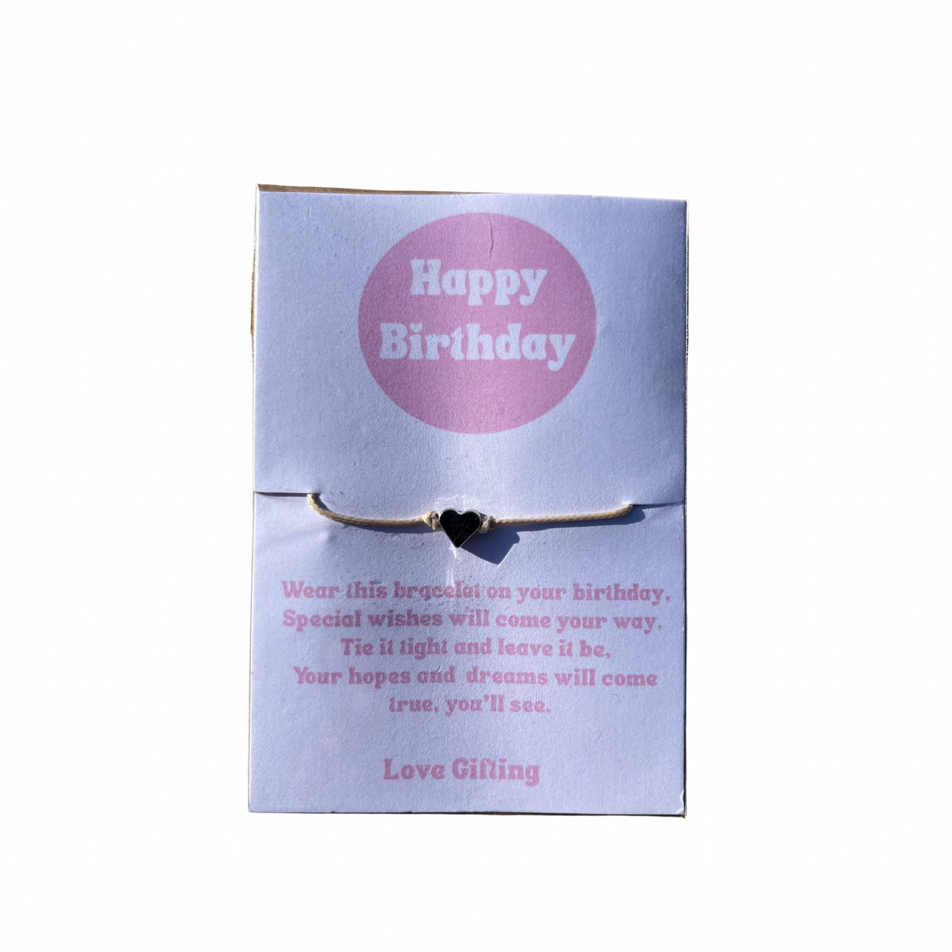 Bracelet on a 'Happy Birthday' card with text