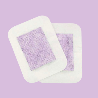 Two bandage patches on a light purple background
