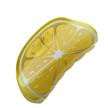 Yellow lemon Hair clip on a white background