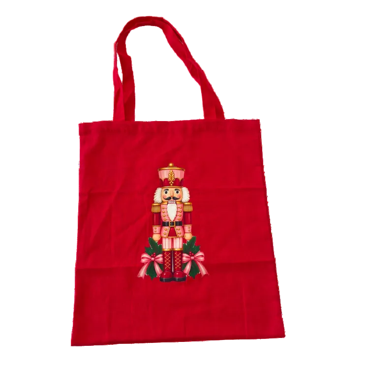 Red Nutcracker Christmas canvas tote bag featuring a festive nutcracker design – reusable Christmas shopping bag and gift box add-on