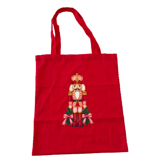 Red Nutcracker Christmas canvas tote bag featuring a festive nutcracker design – reusable Christmas shopping bag and gift box add-on