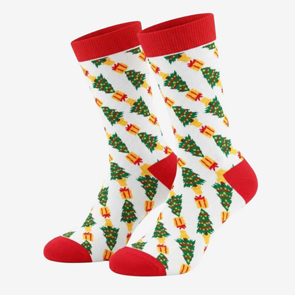 Festive Christmas socks with red cuffs, colourful Christmas trees and presents on a white background, included in Love Gifting Christmas gift boxes.