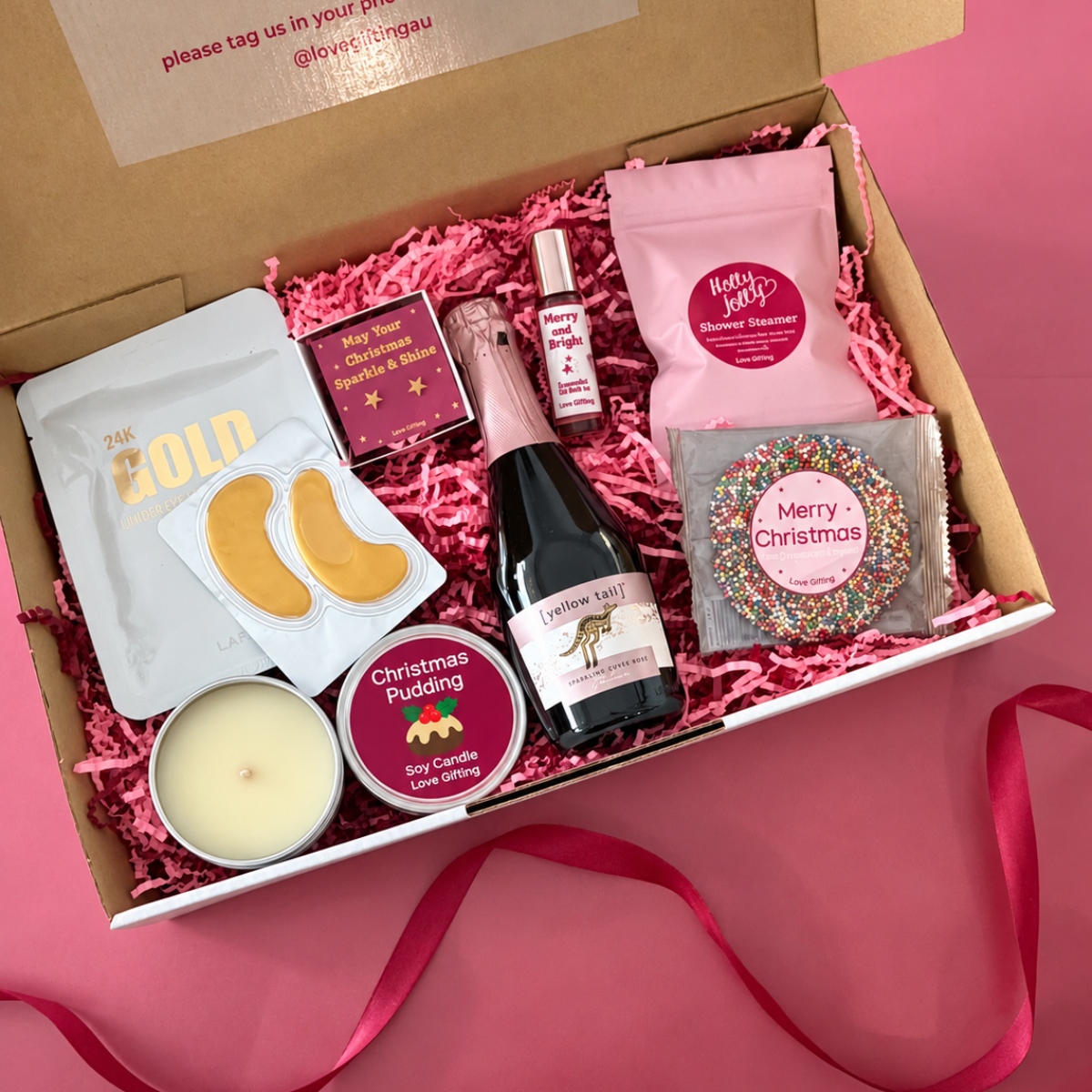Festive Pamper & Treats Christmas Gift Box with sparkling rosé, chocolate, skincare masks, candle and festive gifts