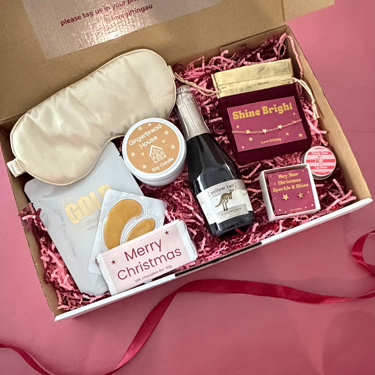 Shine Bright This Christmas jewellery and pamper gift box with sparkling rosé, gold star jewellery, skincare and chocolate