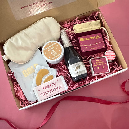 Shine Bright This Christmas jewellery and pamper gift box with sparkling rosé, gold star jewellery, skincare and chocolate