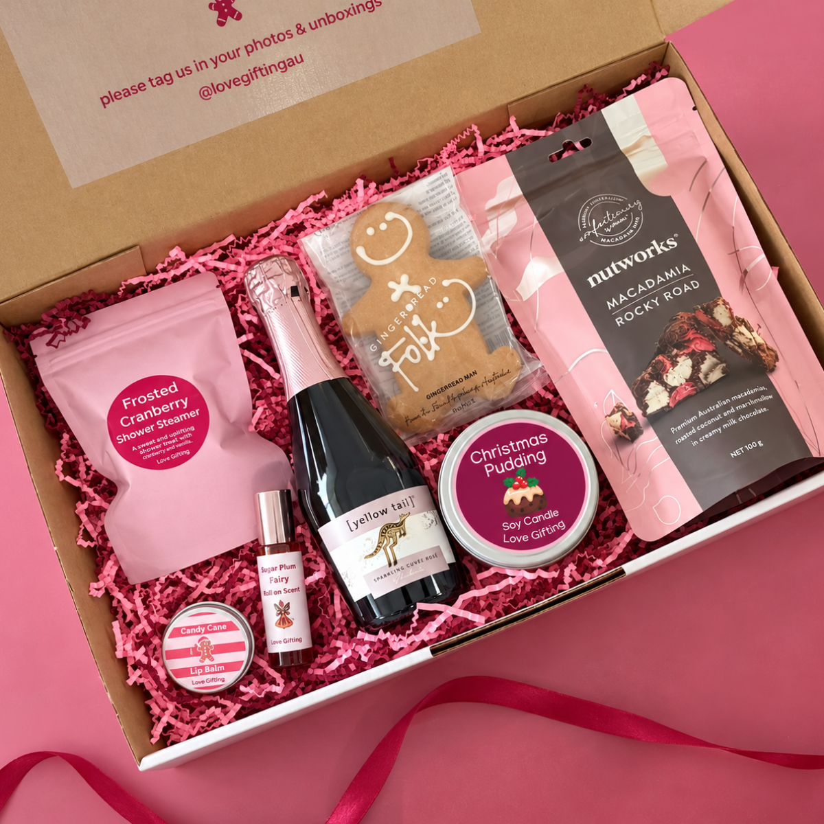 Cheers to Christmas gift box with Yellow Tail sparkling rosé, gingerbread, Rocky Road, Christmas candle and pamper treats
